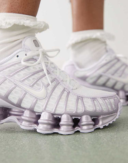 https://images.asos-media.com/products/nike-shox-tl-sneakers-in-white-and-purple/207499163-4?$n_750w$&wid=750&fit=constrain