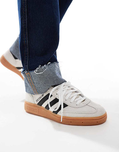 https://images.asos-media.com/products/adidas-originals-handball-spezial-rubber-sole-sneakers-in-cream-and-black/207557326-1-cream?$n_750w$&wid=750&fit=constrain