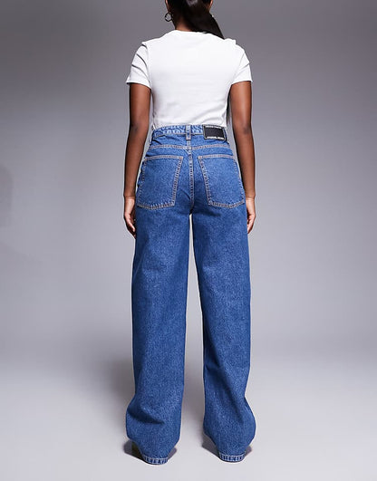 https://images.asos-media.com/products/weekend-collective-baggy-barrel-fit-jeans-in-mid-blue-wash/207615162-2?$n_750w$&wid=750&fit=constrain