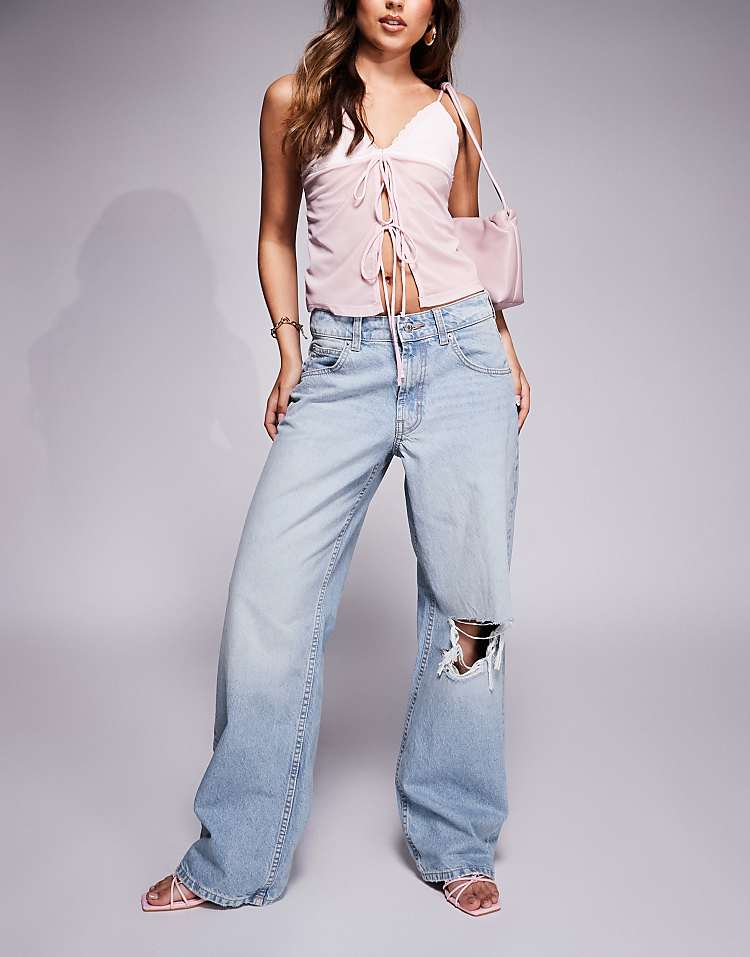 https://images.asos-media.com/products/asos-design-low-rise-baggy-jeans-in-pale-wash/207651216-1-lightwash?$n_750w$&wid=750&fit=constrain