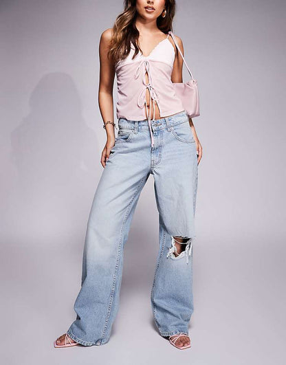https://images.asos-media.com/products/asos-design-low-rise-baggy-jeans-in-pale-wash/207651216-1-lightwash?$n_750w$&wid=750&fit=constrain