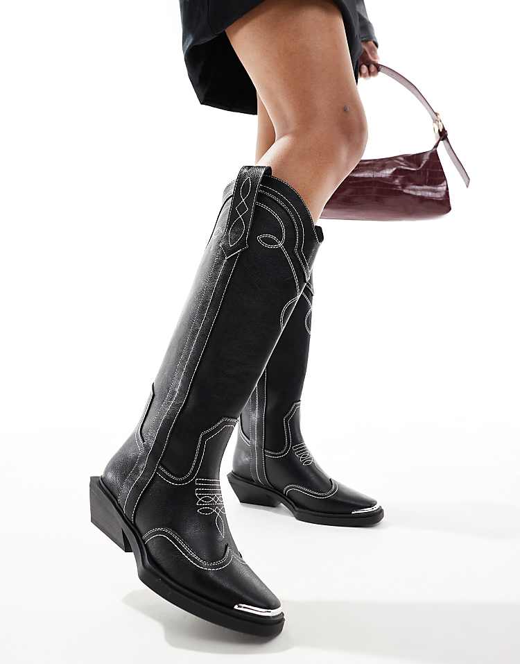 https://images.asos-media.com/products/asos-design-celeste-flat-western-knee-boots-in-black-with-stitching/207706209-1-blackpu?$n_750w$&wid=750&fit=constrain