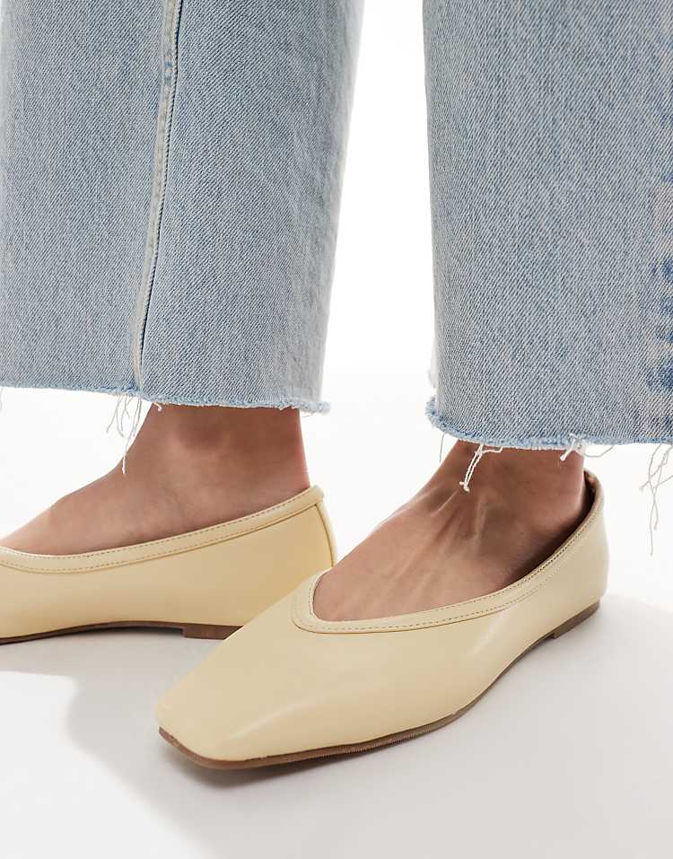 https://images.asos-media.com/products/raid-maryana-square-toe-ballet-flats-in-butter-yellow/207884516-3?$n_750w$&wid=750&fit=constrain
