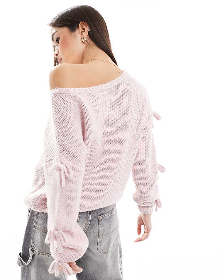 https://images.asos-media.com/products/hollister-slouchy-off-the-shoulder-applique-bow-knit-sweater-in-lilac/207900902-3?$n_750w$&wid=750&fit=constrain