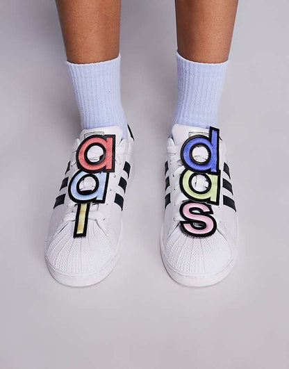 https://images.asos-media.com/products/adidas-originals-superstar-ii-x-jeremy-scott-sneakers-in-white/207950836-1-white?$n_750w$&wid=750&fit=constrain