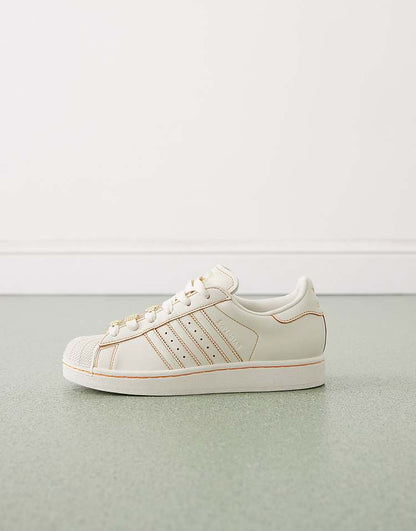 https://images.asos-media.com/products/adidas-originals-superstar-ii-sneakers-with-jewel-detailing-in-off-white/207950866-2?$n_750w$&wid=750&fit=constrain