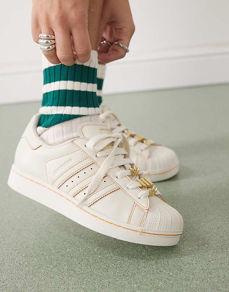 https://images.asos-media.com/products/adidas-originals-superstar-ii-sneakers-with-jewel-detailing-in-off-white/207950866-3?$n_750w$&wid=750&fit=constrain