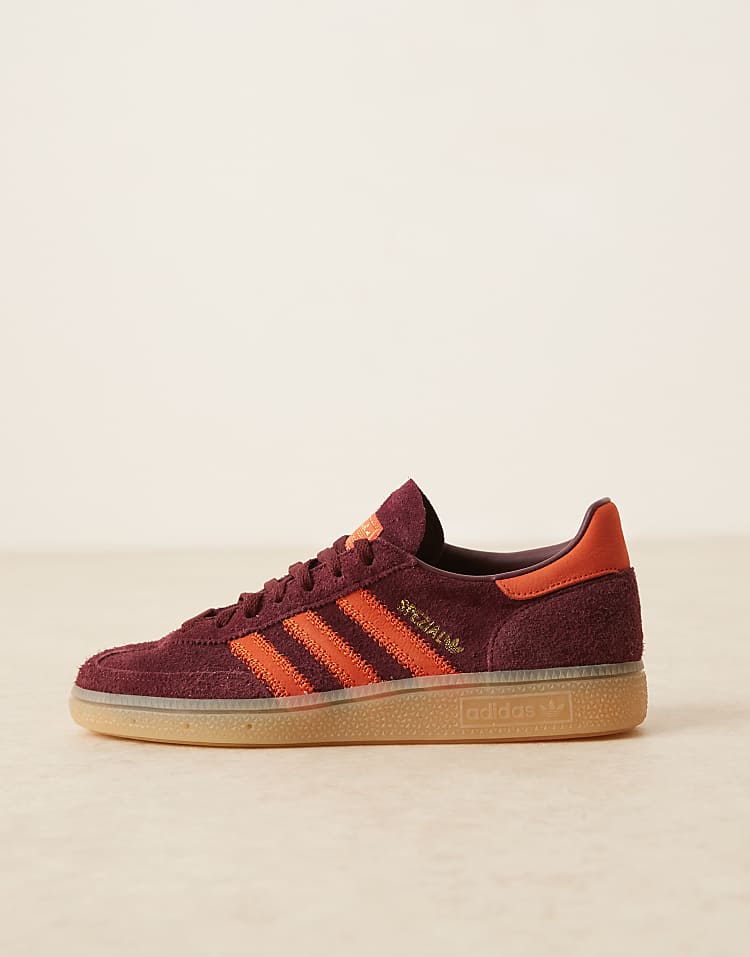 https://images.asos-media.com/products/adidas-originals-handball-spezial-sneakers-in-burgundy-and-orange/207951347-2?$n_750w$&wid=750&fit=constrain