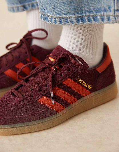 https://images.asos-media.com/products/adidas-originals-handball-spezial-sneakers-in-burgundy-and-orange/207951347-3?$n_750w$&wid=750&fit=constrain
