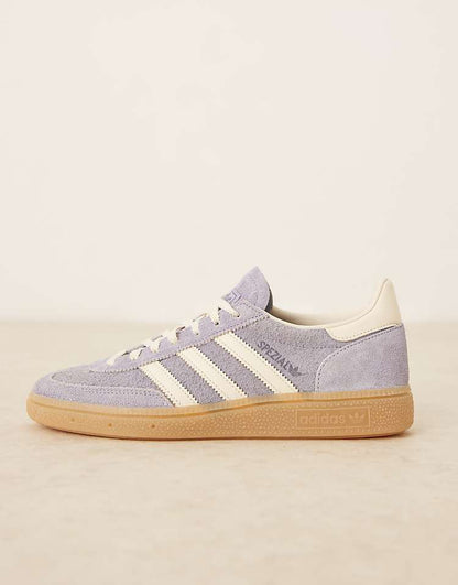 https://images.asos-media.com/products/adidas-originals-handball-spezial-sneakers-in-purple-and-white/207951483-2?$n_750w$&wid=750&fit=constrain