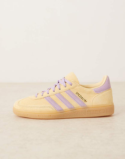 https://images.asos-media.com/products/adidas-originals-handball-spezial-sneakers-in-orange-and-purple/207951662-2?$n_750w$&wid=750&fit=constrain