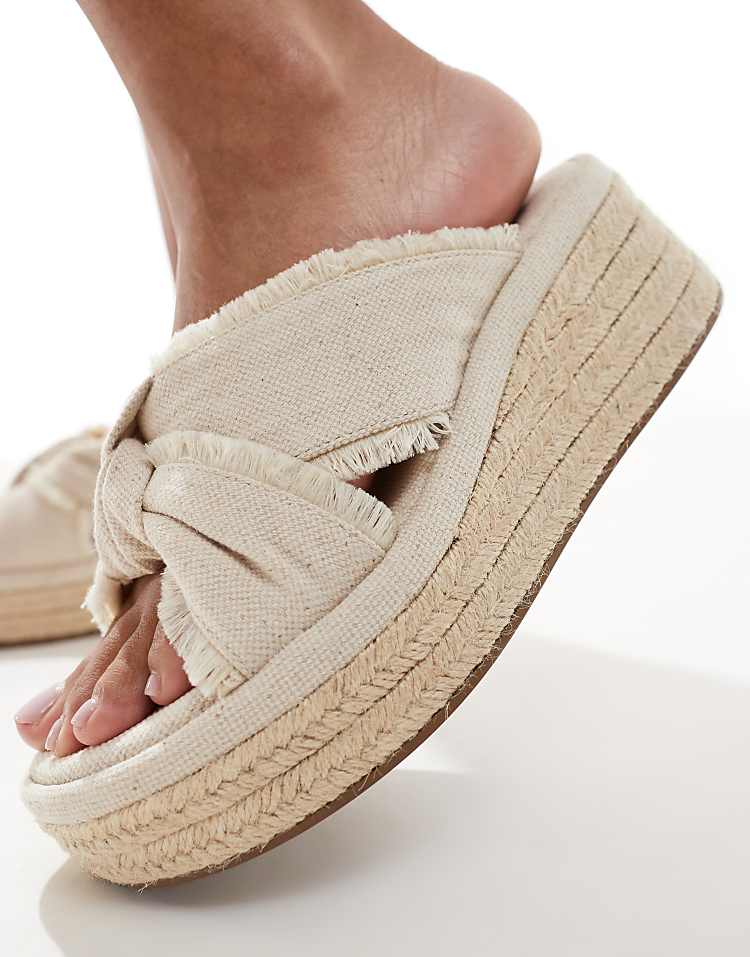 https://images.asos-media.com/products/asos-design-thoughtful-knot-detail-flatform-mules-in-natural/207968531-2?$n_750w$&wid=750&fit=constrain