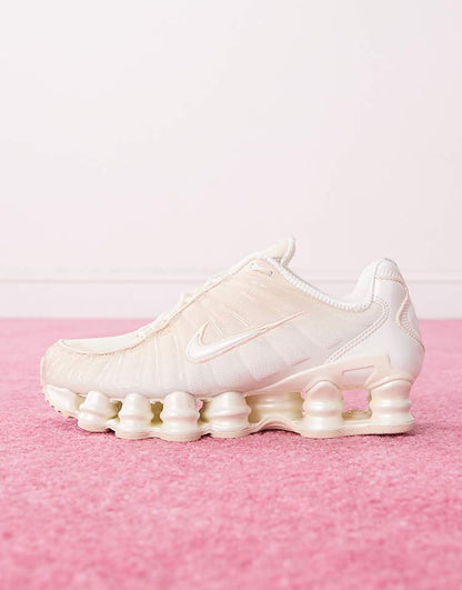 https://images.asos-media.com/products/nike-shox-tl-pearlised-sneakers-in-light-pinks/207981766-2?$n_750w$&wid=750&fit=constrain