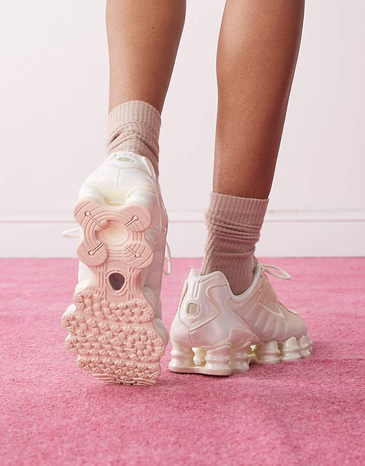 https://images.asos-media.com/products/nike-shox-tl-pearlised-sneakers-in-light-pinks/207981766-4?$n_750w$&wid=750&fit=constrain