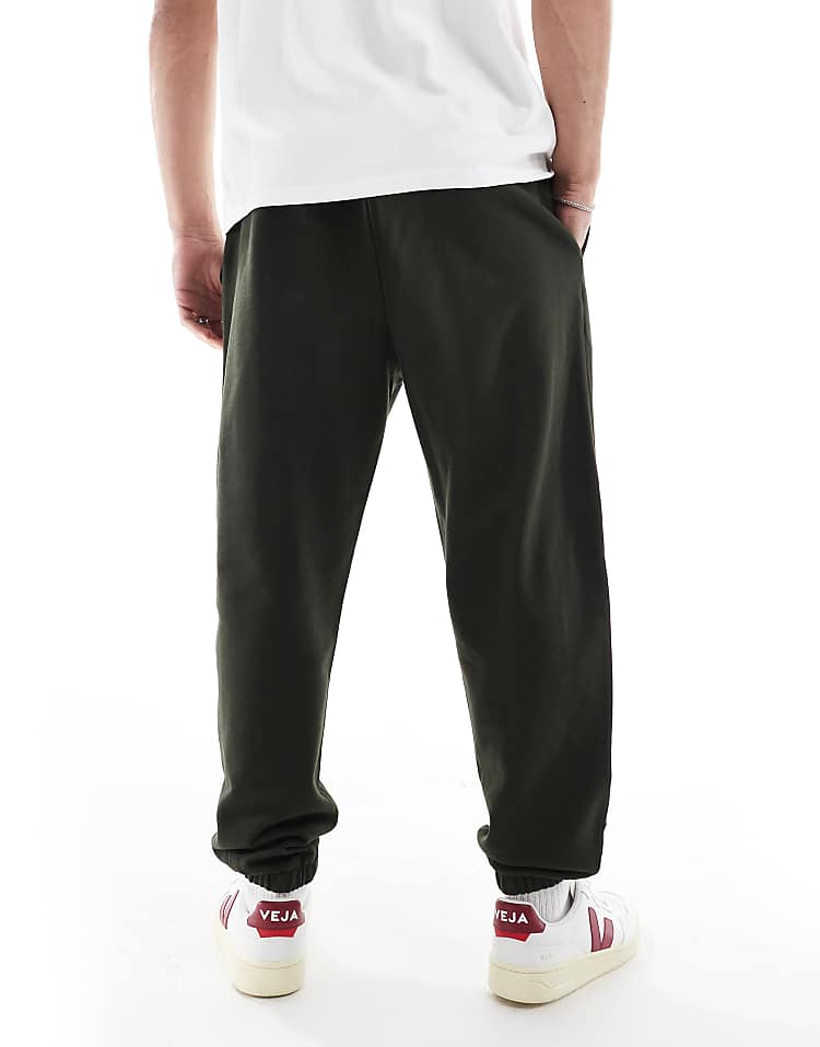 https://images.asos-media.com/products/asos-design-essential-tapered-sweatpants-in-dark-green/208010580-3?$n_750w$&wid=750&fit=constrain