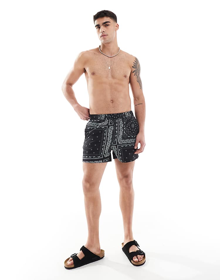 https://images.asos-media.com/products/river-island-swim-shorts-in-black-bandana-print/208146895-2?$n_750w$&wid=750&fit=constrain