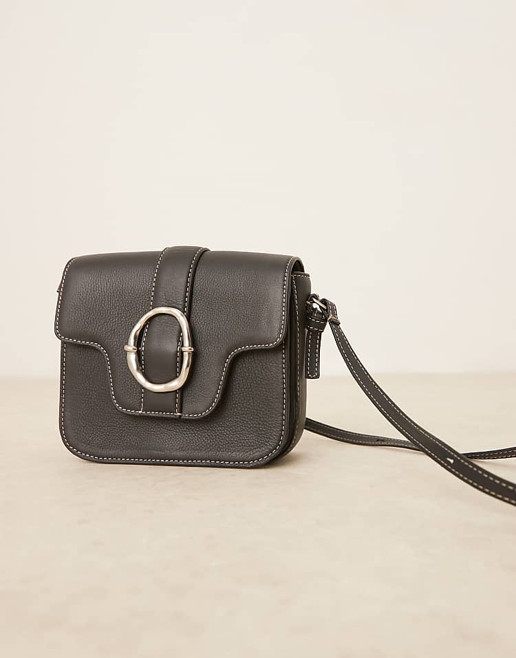 https://images.asos-media.com/products/becksondergaard-iris-leather-crossbody-buckle-bag-in-black/208153274-1-black?$n_750w$&wid=750&fit=constrain