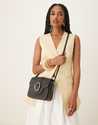 https://images.asos-media.com/products/becksondergaard-iris-leather-crossbody-buckle-bag-in-black/208153274-2?$n_750w$&wid=750&fit=constrain