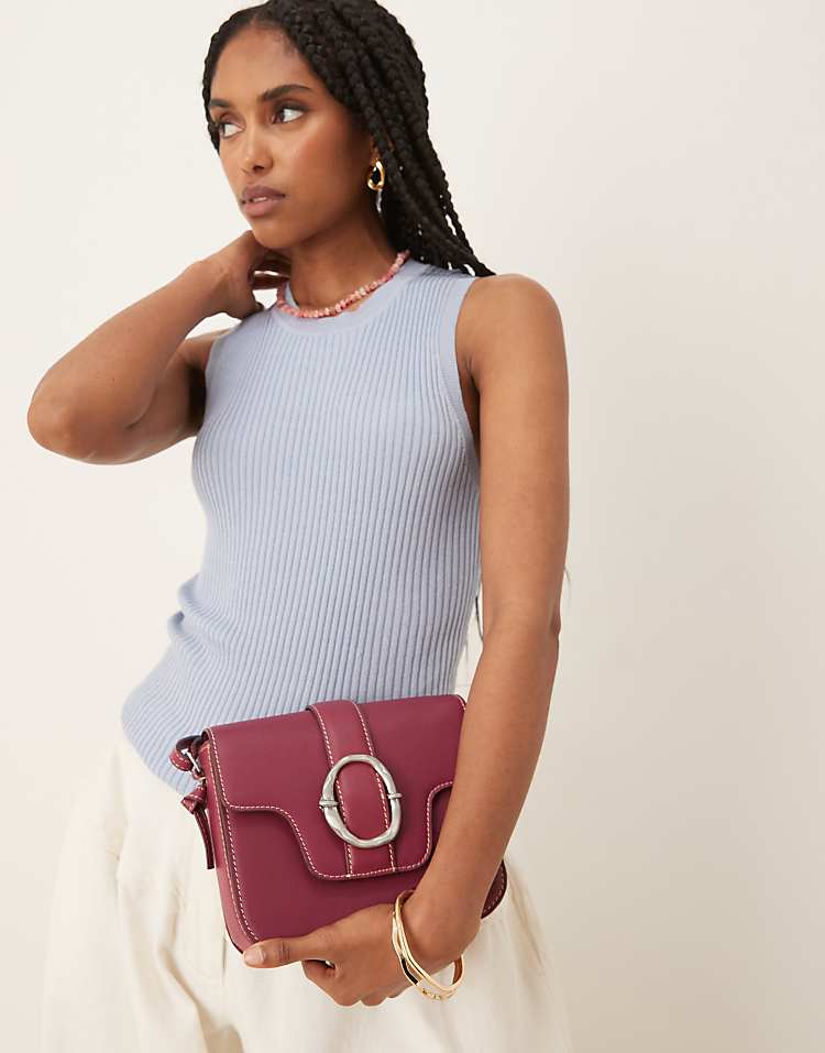 https://images.asos-media.com/products/becksondergaard-iris-leather-crossbody-buckle-bag-in-burgundy/208153292-2?$n_750w$&wid=750&fit=constrain