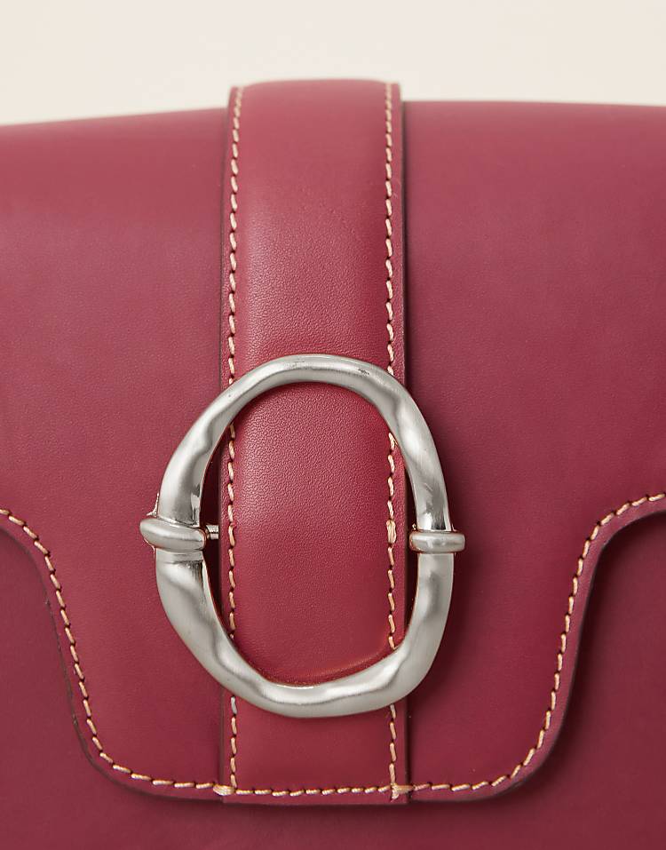 https://images.asos-media.com/products/becksondergaard-iris-leather-crossbody-buckle-bag-in-burgundy/208153292-4?$n_750w$&wid=750&fit=constrain