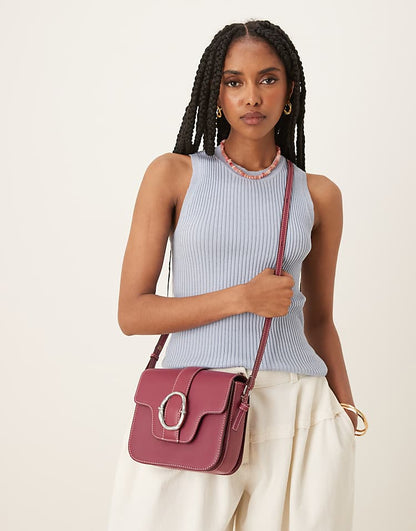 https://images.asos-media.com/products/becksondergaard-iris-leather-crossbody-buckle-bag-in-burgundy/208153292-5?$n_750w$&wid=750&fit=constrain