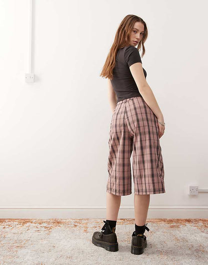 https://images.asos-media.com/products/collusion-baggy-longline-jorts-in-pink-plaid/208186275-3?$n_750w$&wid=750&fit=constrain