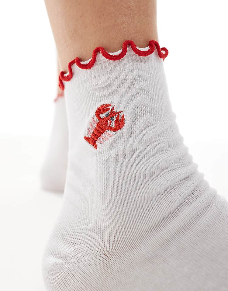 https://images.asos-media.com/products/asos-design-frill-top-socks-with-lobster-embroidered-design-in-white/208282734-2?$n_750w$&wid=750&fit=constrain