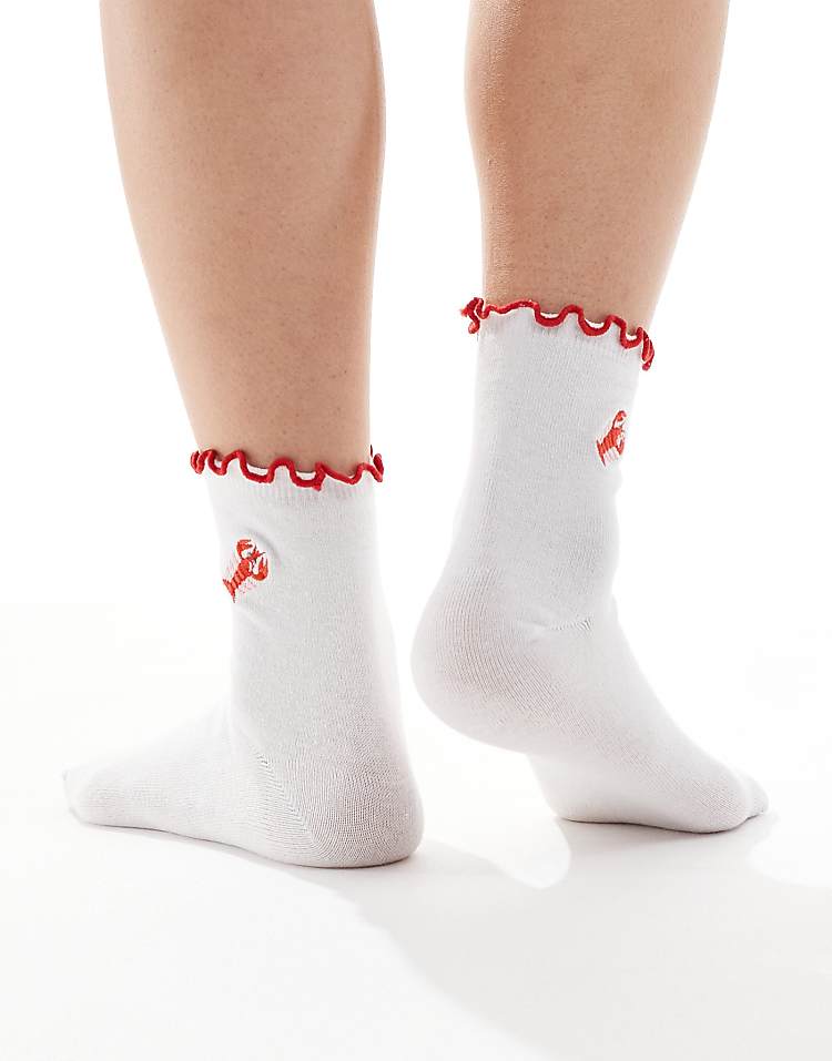 https://images.asos-media.com/products/asos-design-frill-top-socks-with-lobster-embroidered-design-in-white/208282734-3?$n_750w$&wid=750&fit=constrain