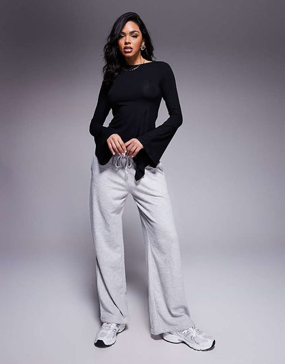 https://images.asos-media.com/products/asos-design-angel-sleeve-top-with-flare-detail-in-black/208369878-2?$n_750w$&wid=750&fit=constrain