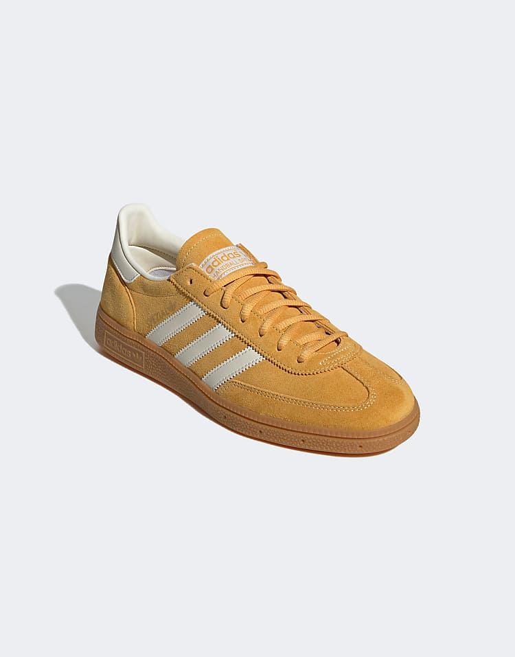 https://images.asos-media.com/products/adidas-originals-handball-spezial-sneakers-in-yellow-and-white/208376599-2?$n_750w$&wid=750&fit=constrain