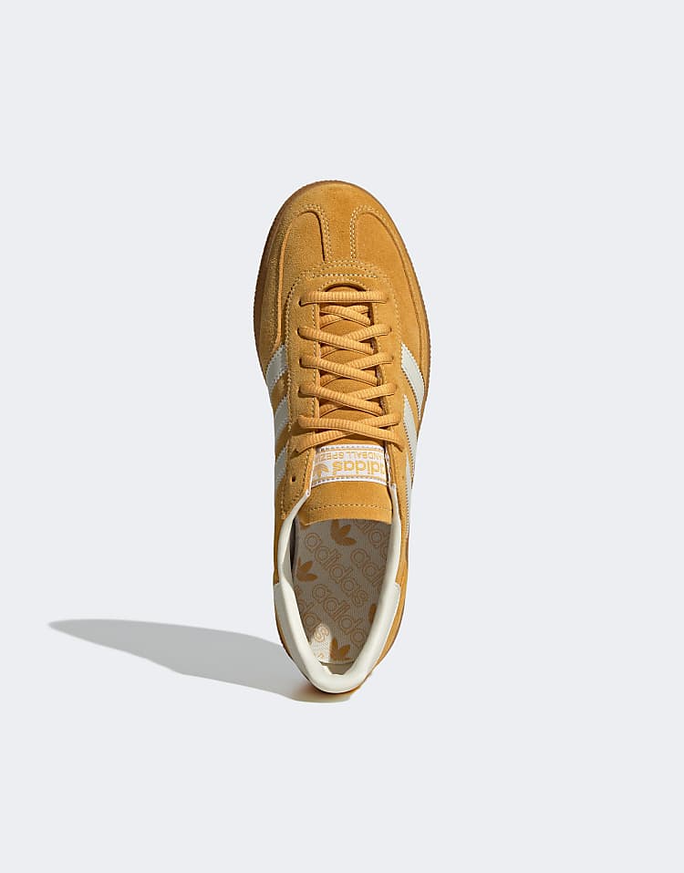 https://images.asos-media.com/products/adidas-originals-handball-spezial-sneakers-in-yellow-and-white/208376599-3?$n_750w$&wid=750&fit=constrain