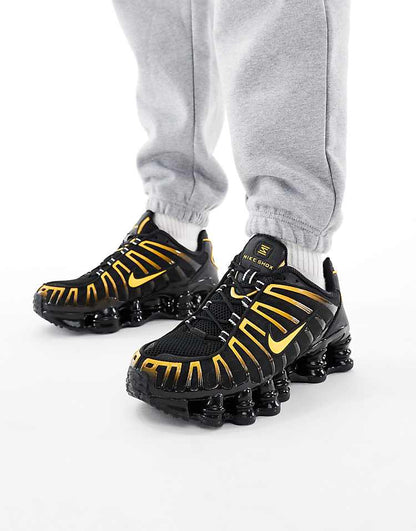 https://images.asos-media.com/products/nike-shox-tl-sneakers-in-black-and-orange/208418069-1-black?$n_750w$&wid=750&fit=constrain
