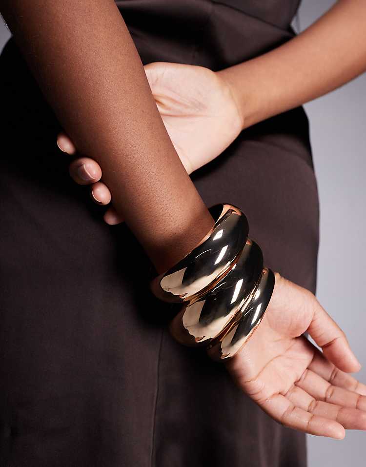 https://images.asos-media.com/products/aldo-bena-pack-of-3-chunky-bangle-bracelets-in-gold/208421723-3?$n_750w$&wid=750&fit=constrain