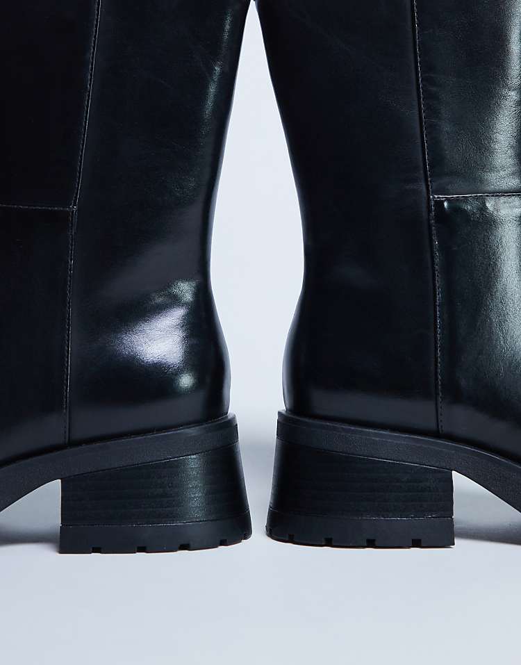 https://images.asos-media.com/products/topshop-nina-chunky-heeled-ankle-boot-in-black/208448688-3?$n_750w$&wid=750&fit=constrain