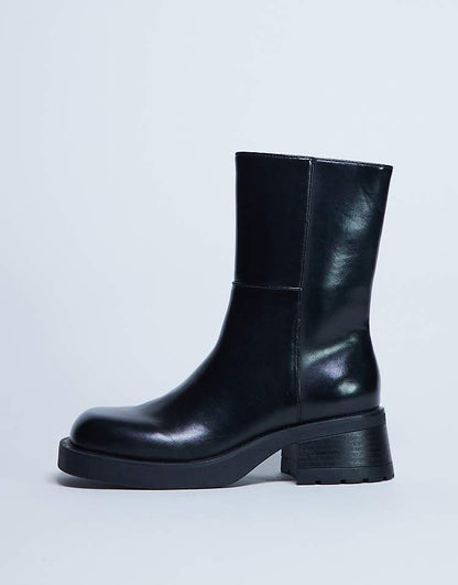 https://images.asos-media.com/products/topshop-nina-chunky-heeled-ankle-boot-in-black/208448688-4?$n_750w$&wid=750&fit=constrain