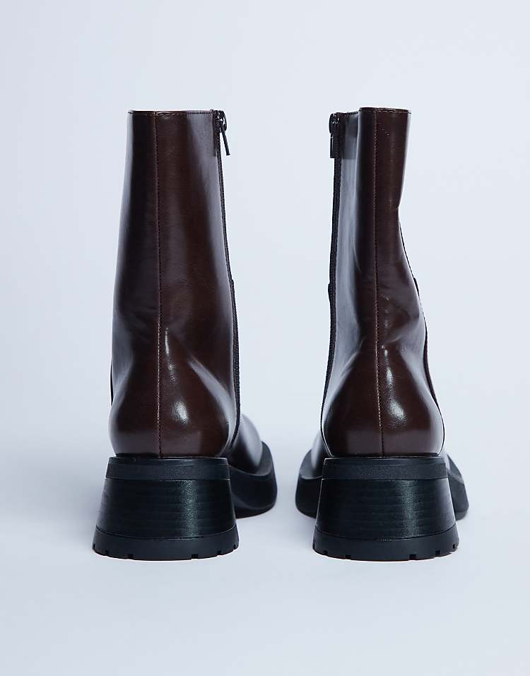 https://images.asos-media.com/products/topshop-nina-chunky-heeled-ankle-boot-in-chocolate/208448699-3?$n_750w$&wid=750&fit=constrain