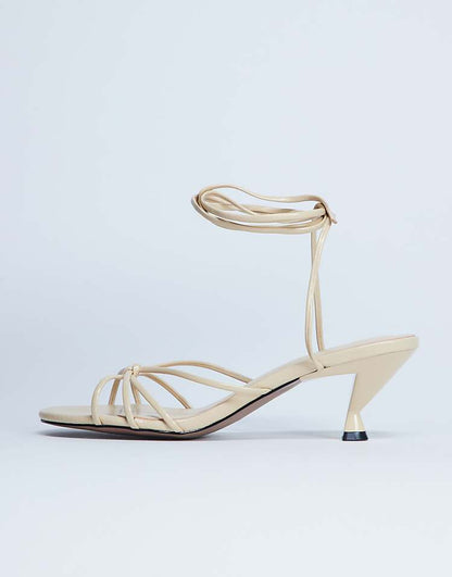 https://images.asos-media.com/products/topshop-itzel-tie-up-mid-heel-sandal-in-buttermilk/208448746-1-buttermilk?$n_750w$&wid=750&fit=constrain