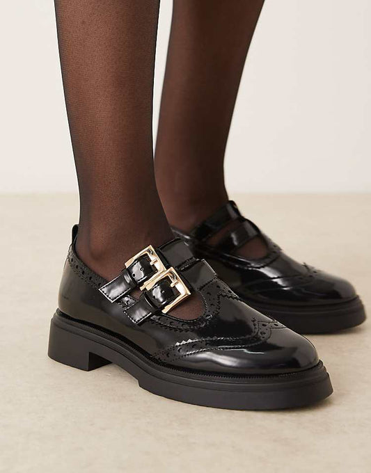 https://images.asos-media.com/products/asos-design-marigold-chunky-buckle-detail-flat-shoes-in-black/208520628-1-black?$n_750w$&wid=750&fit=constrain