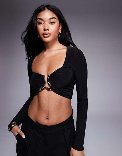 https://images.asos-media.com/products/river-island-wavy-trim-crop-top-in-black/208539717-1-black?$n_750w$&wid=750&fit=constrain