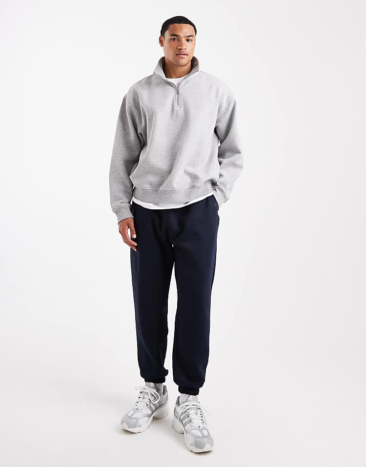 https://images.asos-media.com/products/asos-design-essential-tapered-sweatpants-in-navy/208549001-2?$n_750w$&wid=750&fit=constrain