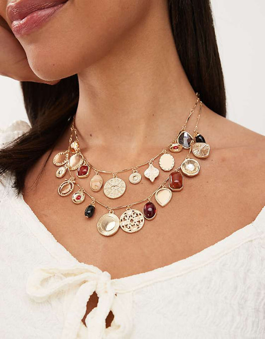 https://images.asos-media.com/products/reclaimed-vintage-2-row-charm-necklace-in-gold/208565162-1-gold?$n_750w$&wid=750&fit=constrain