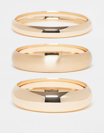 https://images.asos-media.com/products/asos-design-pack-of-3-bangles-in-gold-tone/208583168-1-gold?$n_750w$&wid=750&fit=constrain