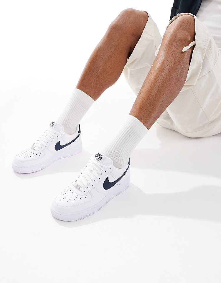 https://images.asos-media.com/products/nike-air-force-1-07-sneakers-in-white-and-navy/208607065-1-white?$n_750w$&wid=750&fit=constrain