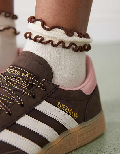 https://images.asos-media.com/products/adidas-originals-handball-spezial-sneakers-in-dark-brown-with-pink-details/208660677-3?$n_750w$&wid=750&fit=constrain