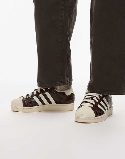 https://images.asos-media.com/products/adidas-originals-superstar-ii-sneakers-in-snake-print/208660811-1-brown?$n_750w$&wid=750&fit=constrain