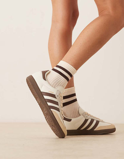 https://images.asos-media.com/products/adidas-originals-samba-og-sneakers-in-off-white-and-brown/208660830-3?$n_750w$&wid=750&fit=constrain