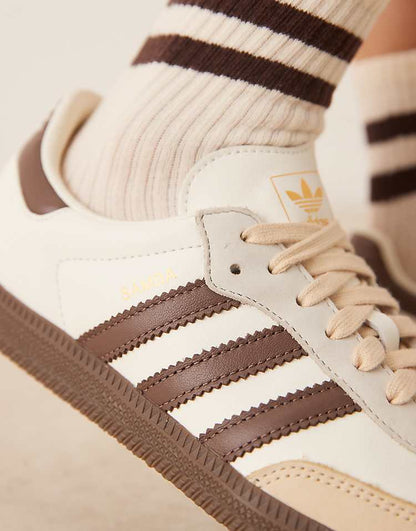 https://images.asos-media.com/products/adidas-originals-samba-og-sneakers-in-off-white-and-brown/208660830-4?$n_750w$&wid=750&fit=constrain