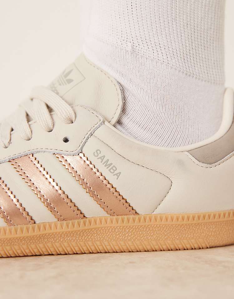 https://images.asos-media.com/products/adidas-originals-samba-og-sneakers-in-white-and-rose-gold/208660949-3?$n_750w$&wid=750&fit=constrain