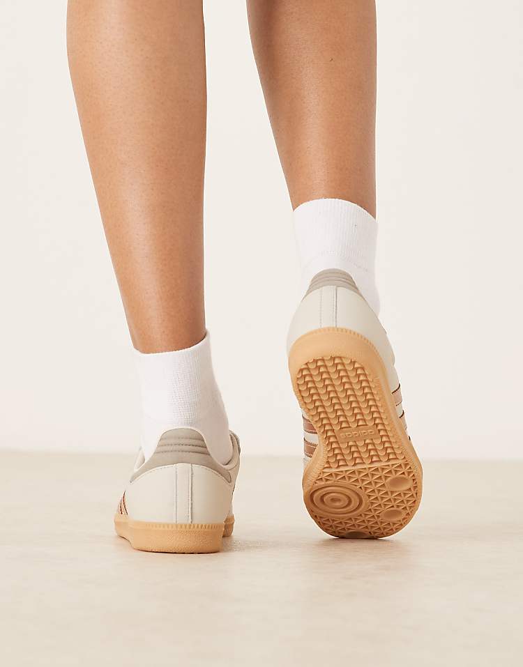 https://images.asos-media.com/products/adidas-originals-samba-og-sneakers-in-white-and-rose-gold/208660949-4?$n_750w$&wid=750&fit=constrain