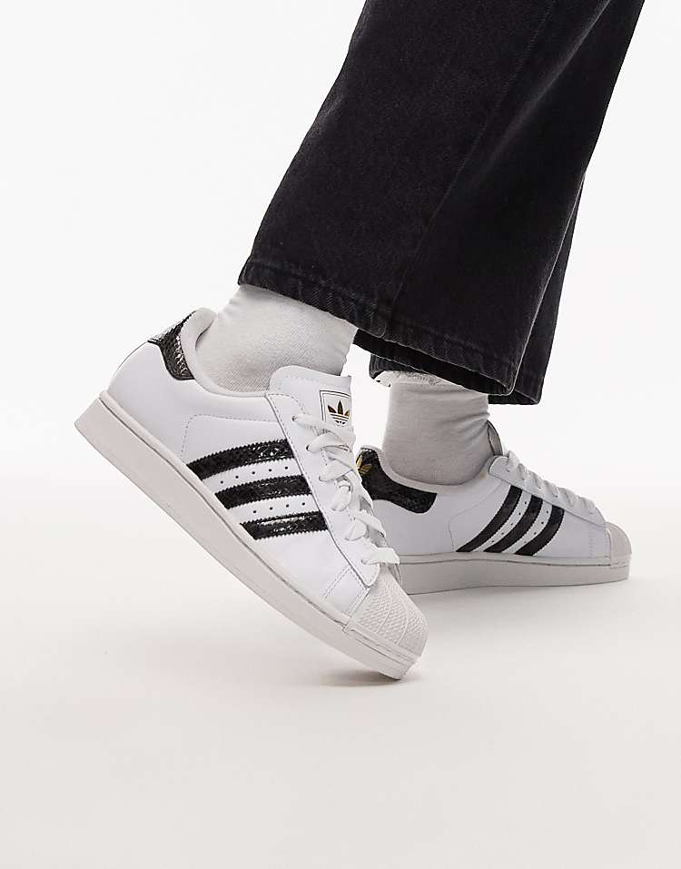 https://images.asos-media.com/products/adidas-originals-superstar-ii-sneakers-in-white-and-snake-print-black/208661548-1-white?$n_750w$&wid=750&fit=constrain